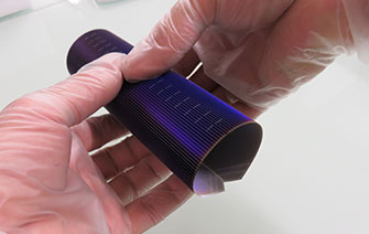 Ultra-thin heterojunction photovoltaic cells for space