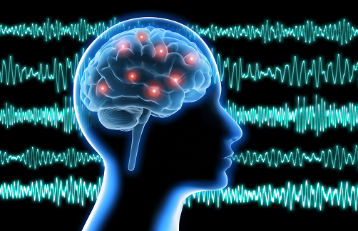 Beta brain waves and sensory features in individuals with autism